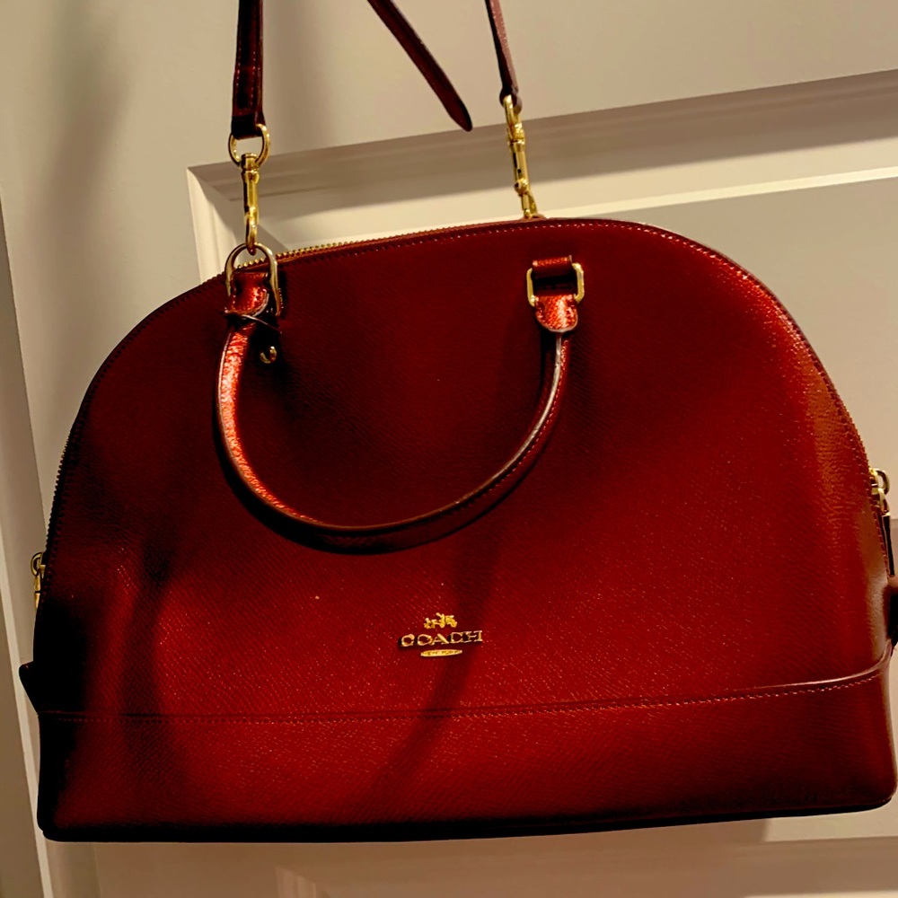 Copper colored coach purse